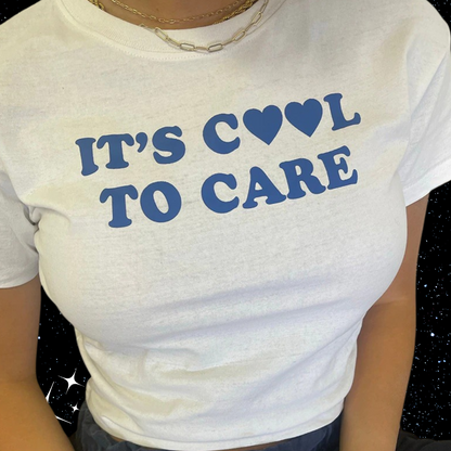 It's Cool To Care White Crop Tee